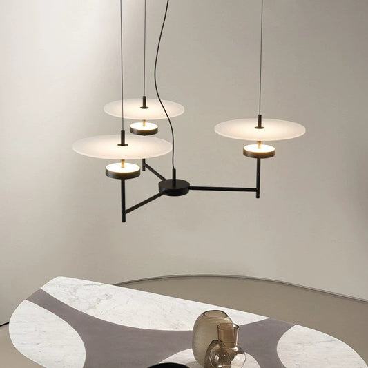 Orbit Axis chandelier with disc-shaped acrylic shades on a black geometric frame