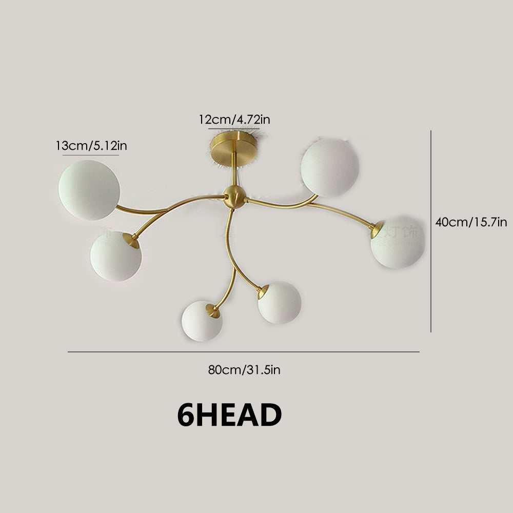 Golden Bloom chandelier with gold-tone branches and milky glass globes